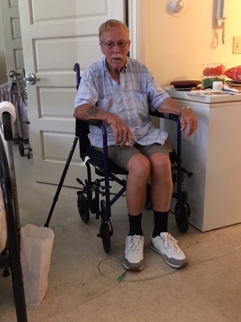 A man on a wheelchair